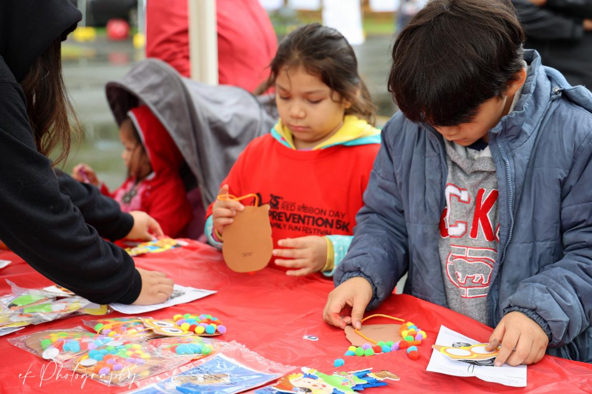 child at red ribbon day